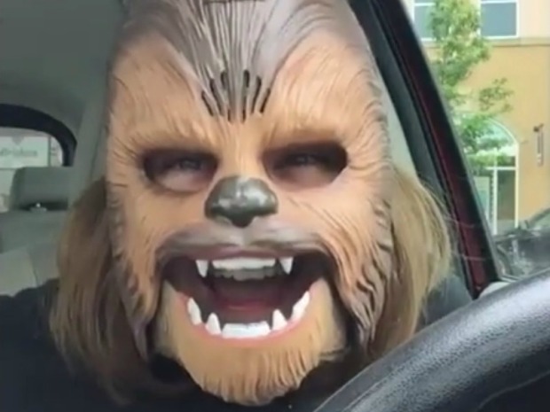 this-woman-is-so-happy-about-finding-this-chewbacca-mask-that-its-hard-not-to-get-excited-right-along-with-her